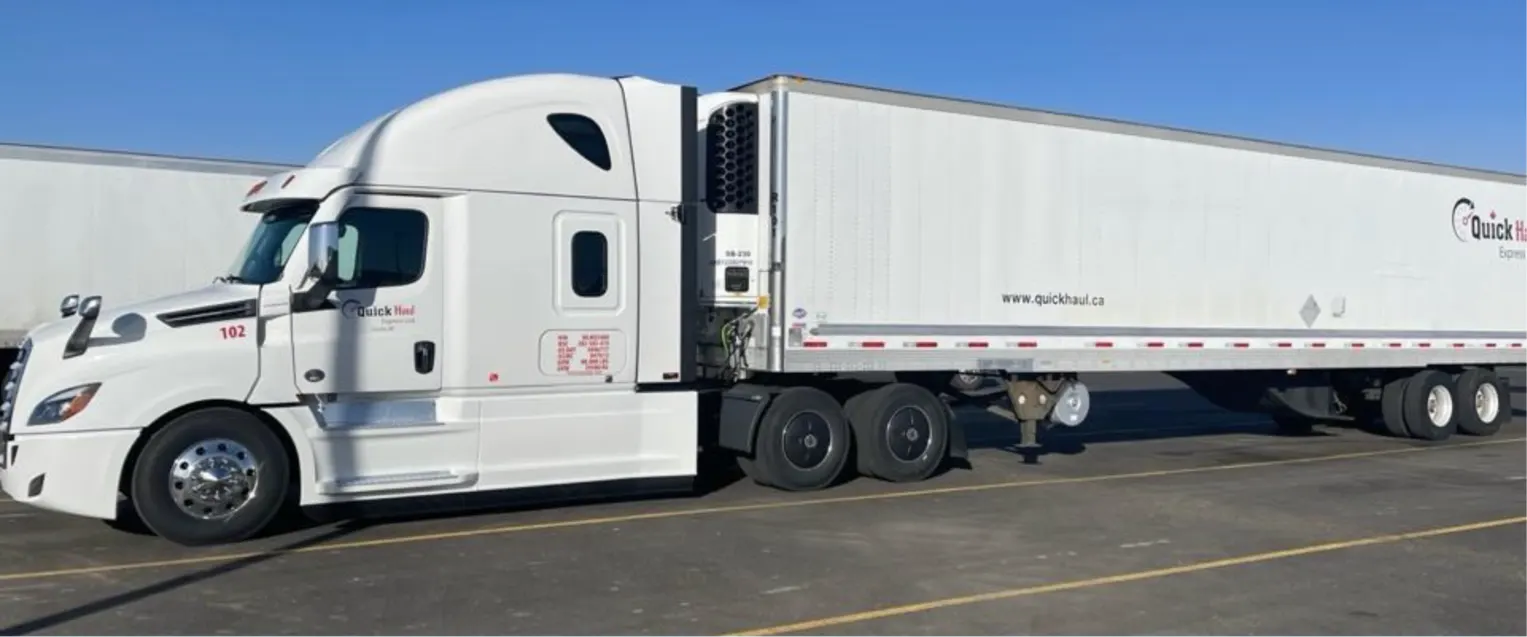 Quick Haul Freightliner Cascadia, unit 102, with refrigerated trailer